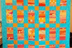 Orange Strip Donation Top