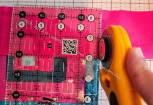 Trim the facing after you have pinned it