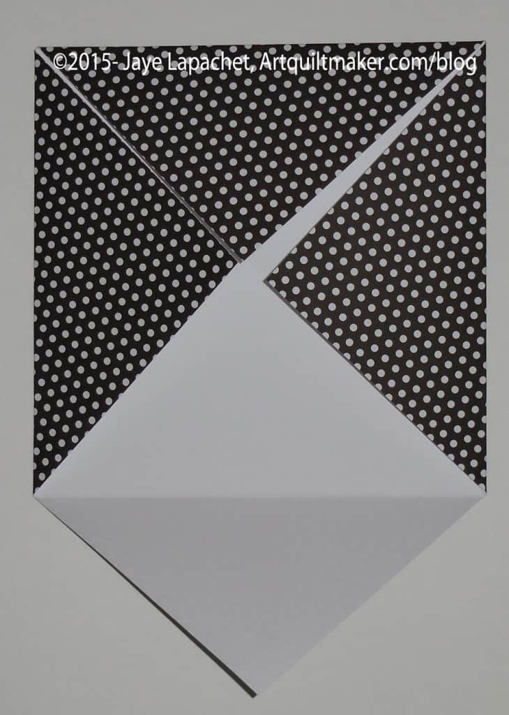 Fold corners into center