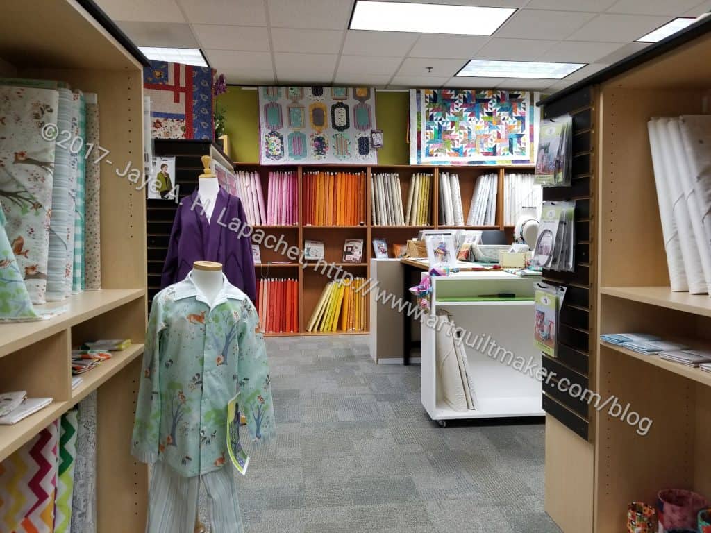 A Common Thread: fabric area with displays