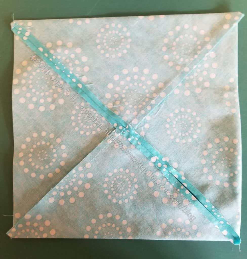 Press seam open to minimize bulk