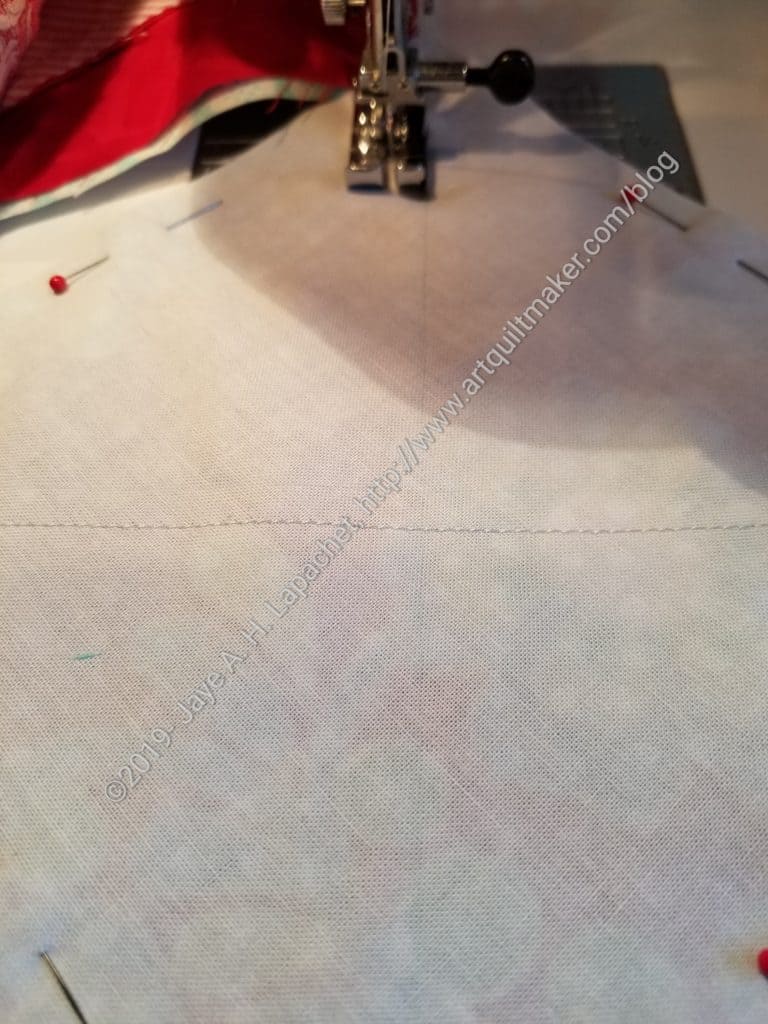 Sew on each side of the line 1/4 inch away from the line