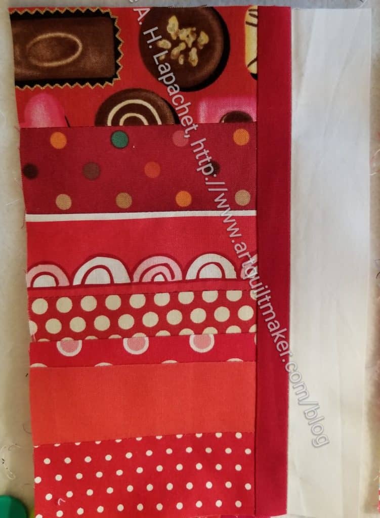 Sew vertical sashing to right side of block