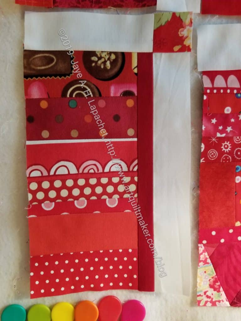 Top sashing sewn to block with vertical sashing