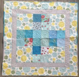 Charming donation quilt finished!
