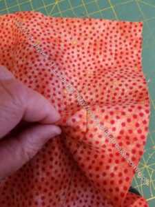 Bullseye: Pinch fabric layers away from each other