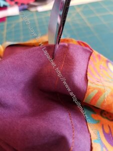 Bullseye: Cut parallel to the line of stitching