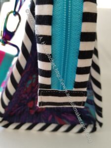 Take a Stand/Without a Trace Bag zipper tab updated