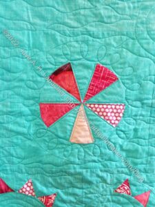 Pies & Points wheel motif quilted