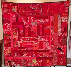 Red Improv donation quilt finished