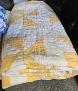 Yellow Pinwheel quilt, folded