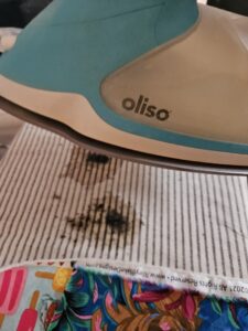 Oliso spits out black gunk
