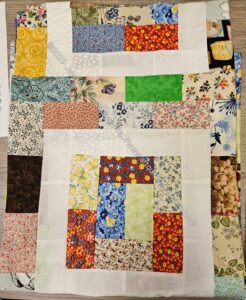 Potato Chip example -flower block with self-sashing by Kay