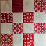 Red, white and black donation block