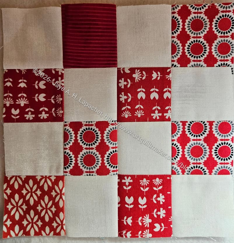 Red, white and black donation block