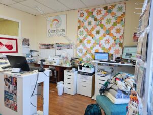 Coastside Quilts behind the counter