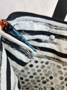 Oxbow Tote -side pleat rivet