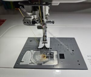 Ultraglide foot and needle plate
