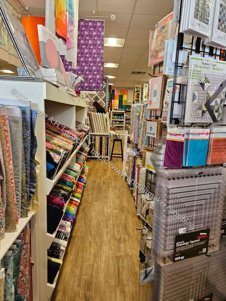 Blue Bar Quilts - front of store with rulers